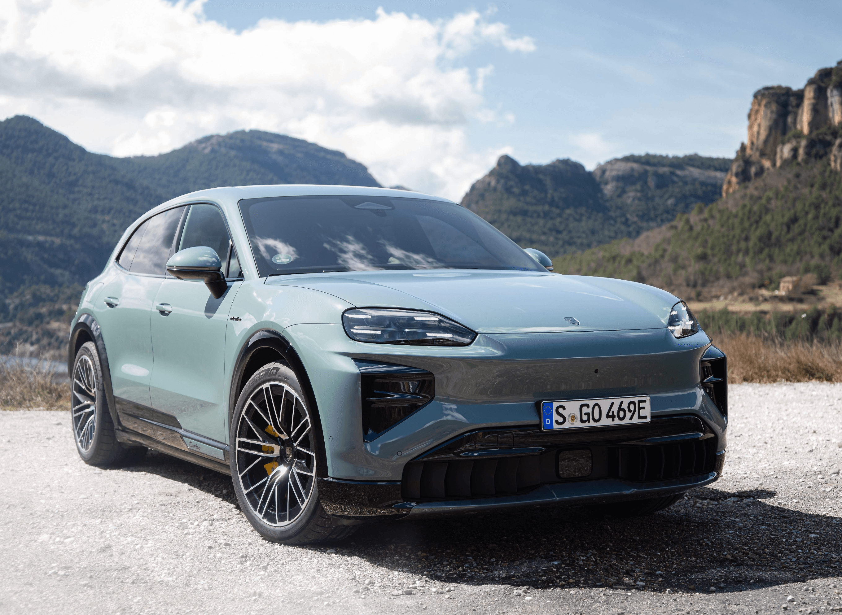 Electric Porsche Cayenne on the move, front three-quarter view